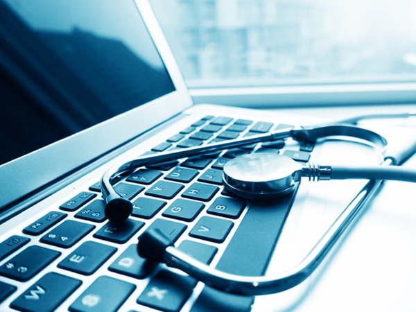 Stethoscope on a laptop keyboard