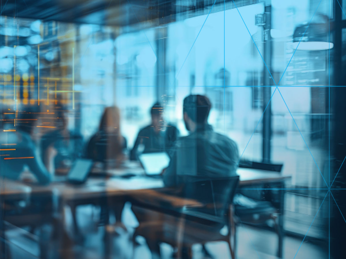 blurry photo of a meeting being conducted in a board room