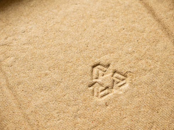 debossed recycle logo on recyclable material
