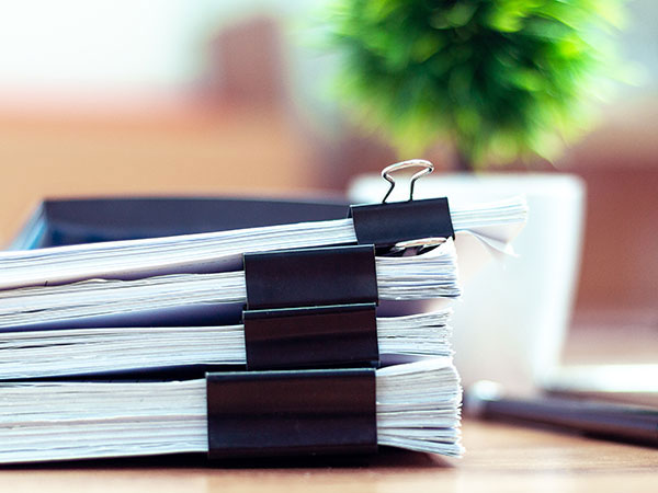 stacks of documents clipped together
