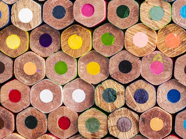 stacked colored pencils